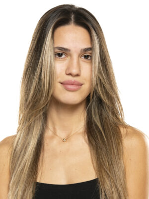 beautiful young women with long balayage painted hair and no makeup on a white studio background.